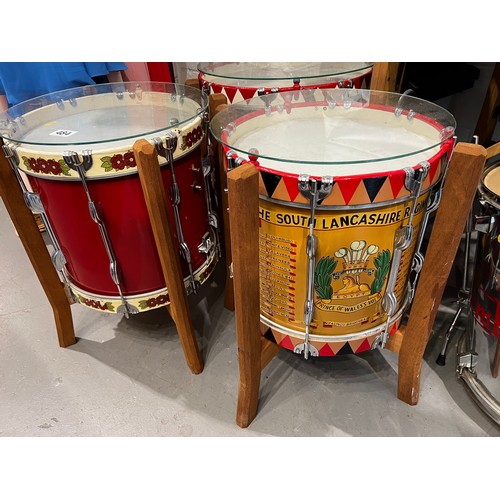 484 - 3 drum tables with glass tops + 1 other drum