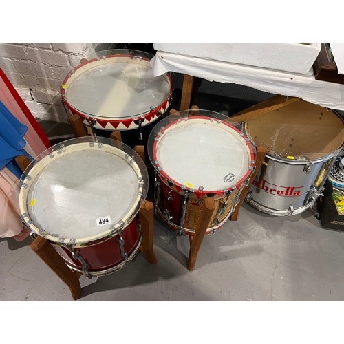 484 - 3 drum tables with glass tops + 1 other drum