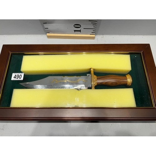 490 - Franklin mint Bowie knife. The John Wayne Commemorative knife on plaque