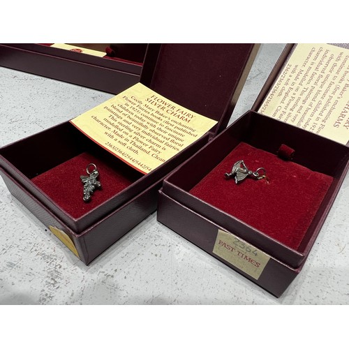 527 - Quantity boxed silver charms by Past Times