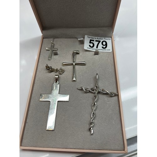 579 - 3 plain silver + silver twist crosses + pair silver earrings