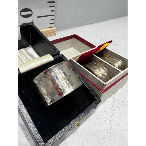 617 - Pair silver napkin rings boxed + Silver napkin ring boxed. 44g gross