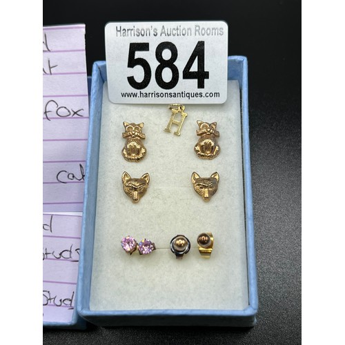 584 - 3 pairs of 9ct gold earrings. Fox, Cat + Pink crystal stud earrings + 9ct H pendant 2.2g gross