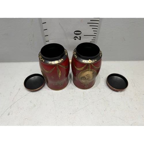 114 - Pair red toleware tea jars