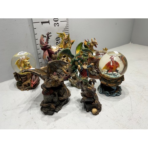 139 - 2 Dragon glitter globes + quantity dragon figures