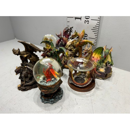 139 - 2 Dragon glitter globes + quantity dragon figures