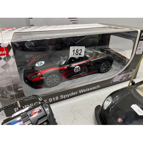 182 - Boxed remote control Porsche 918 spider + remote control Porsche carrera