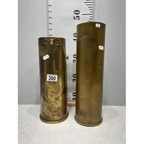 300 - 2 early Brass shell stick stands