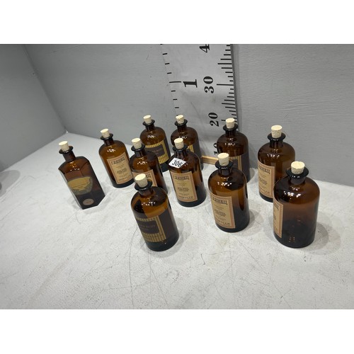 306 - 10 Brown chemist bottles with cork stoppers