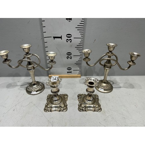 343 - 2 Pair silver plate candle sticks