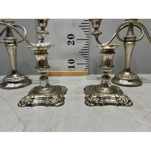 343 - 2 Pair silver plate candle sticks