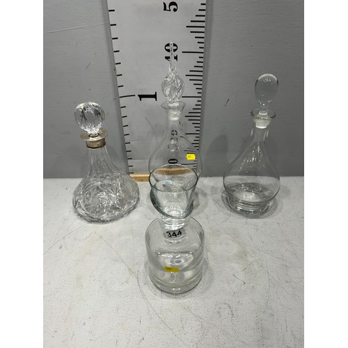 344 - 4 Glass decanters