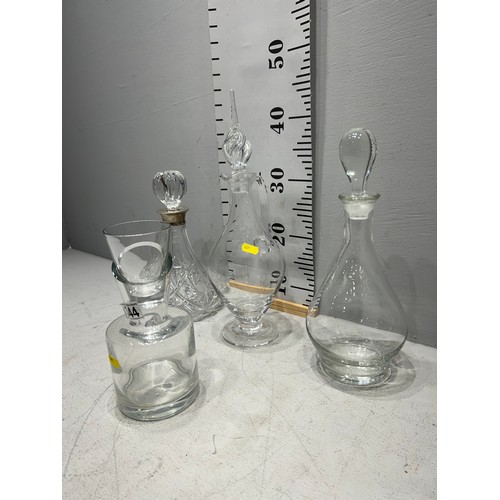 344 - 4 Glass decanters