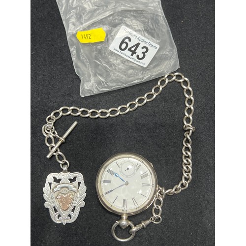 643 - Silver pocket watch & chain with silver medal