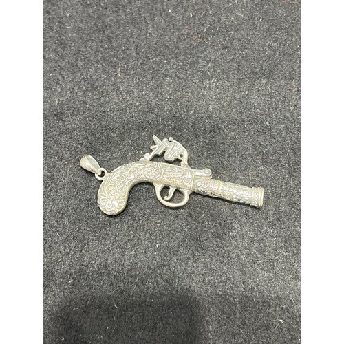 646 - Silver gun pendant