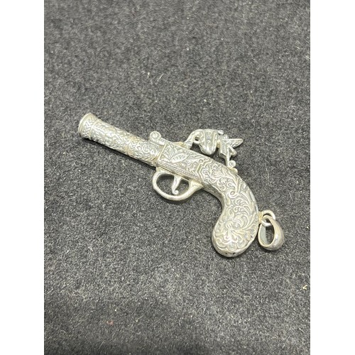 646 - Silver gun pendant