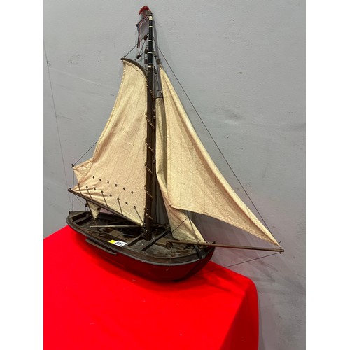 893 - Vintage wooden boat with sails