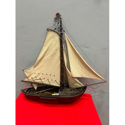 893 - Vintage wooden boat with sails