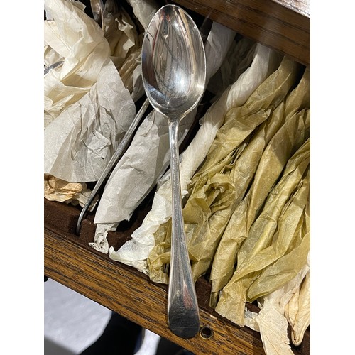 4 - 1920's oak cased canteen cutlery still wrapped in original wrapping