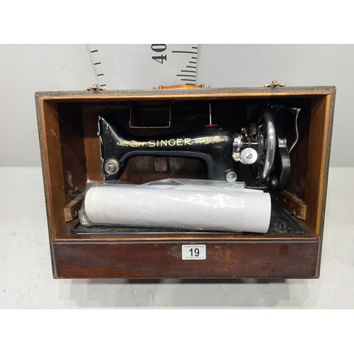 19 - Sewing machine in case