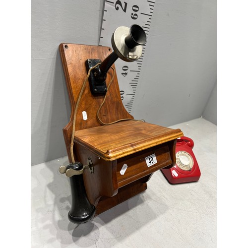 49 - Vintage red telephone + antique Weston elec phone