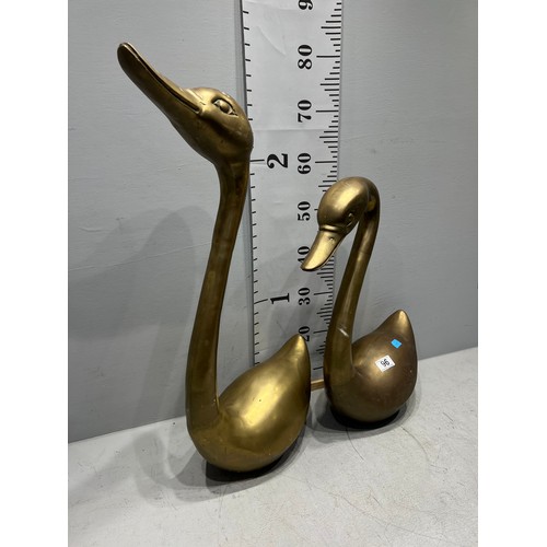 96 - Pair of tall heavy brass ducks