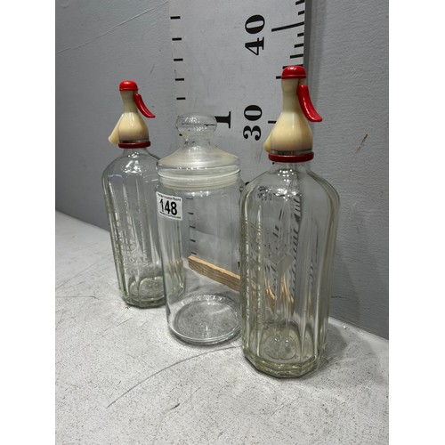 148 - 2 Advertising soda syphons+ glass jar