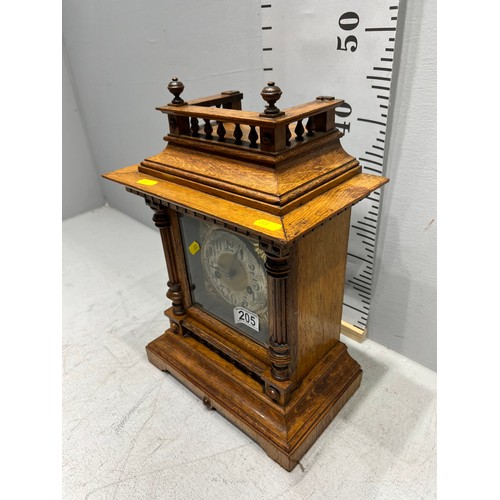 205 - Victorian oak bracket clock with brass face