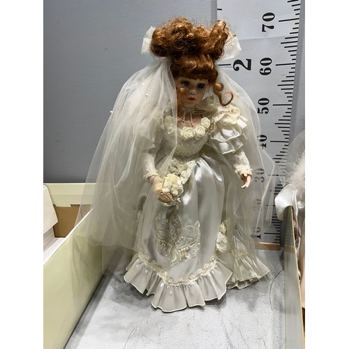 236 - 2 Large boxed porcelain dolls brides