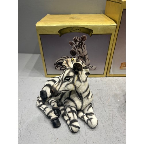 245 - 4 Boxed animals, zebra, giraffe, elephant, rhino