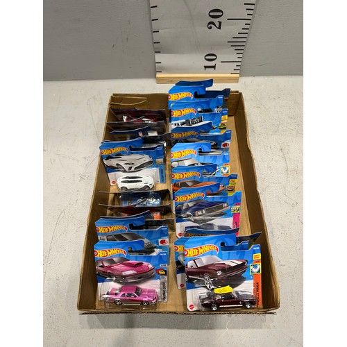 283 - 20 Hot wheels cars. New in packets