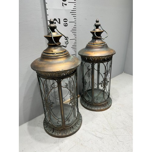 301 - Pair cut glass storm lamps