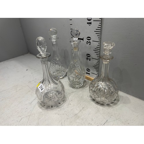 314 - 4 cut glass decanters