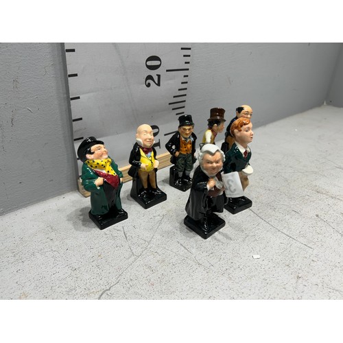 349 - 7 Royal doulton figures buzfuz, Oliver twist, Pickwick etc