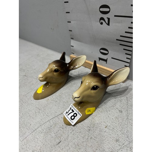 378 - 2 Mid winter deers heads