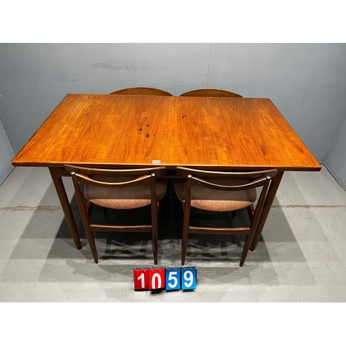 1059 - Kofod larsson for G-plan mid century teak dining table and 4 Kofod larsson dining chairs extending t... 