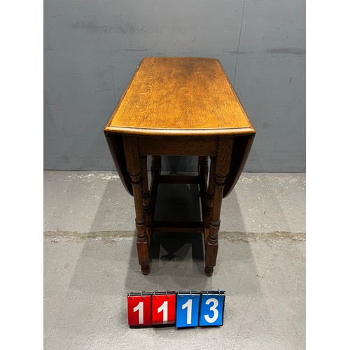 1113 - Light oak drop leaf table