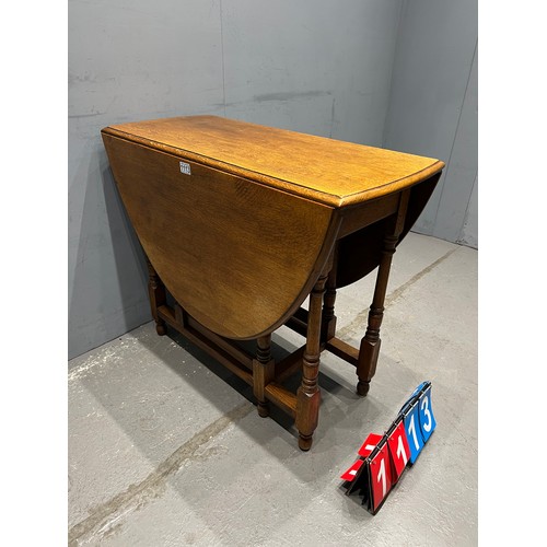 1113 - Light oak drop leaf table