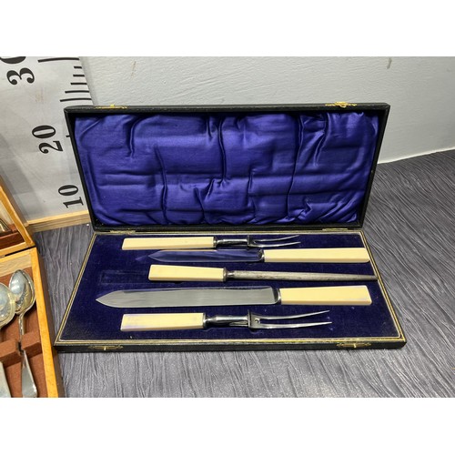 109 - Walnut cased cutlery set + boxed 4 piece carving set