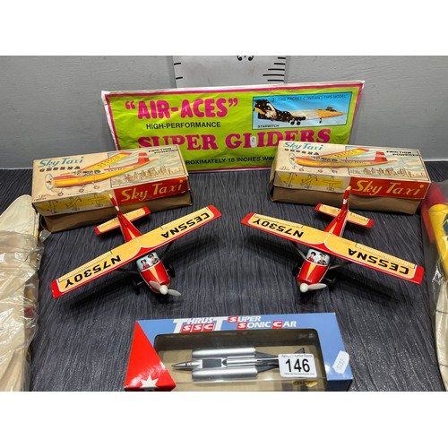 146 - 2 vintage Sky taxis + 2 Spitfire planes + Thrust sonic car