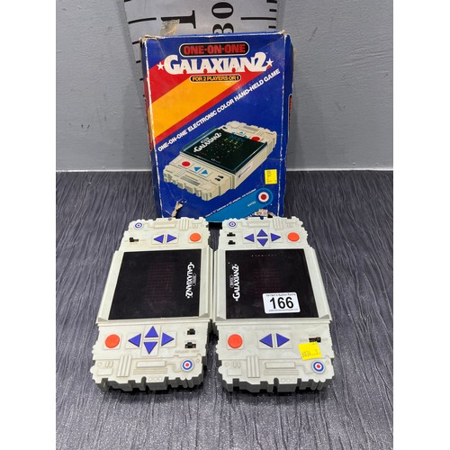 166 - 2 Galaxian hand held c1981 electronic games one inc box & instructions