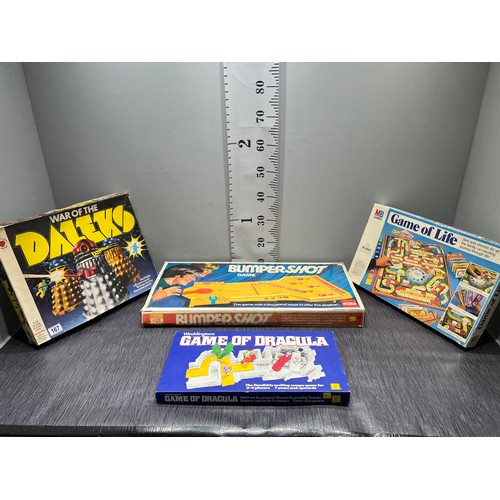 167 - Vintage boxed board games circa 1970's war of darlek, bumper shot game life, Dracula