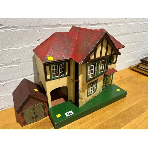 428 - Vintage dolls house & garage + furniture