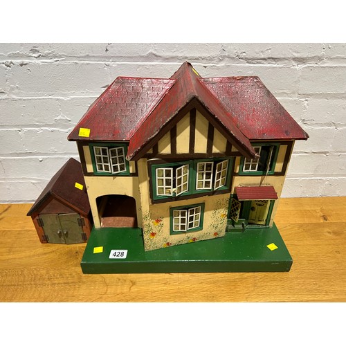 428 - Vintage dolls house & garage + furniture