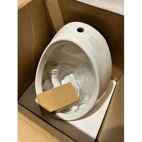 394 - 2 Brand new urinals boxed cost £150 each new