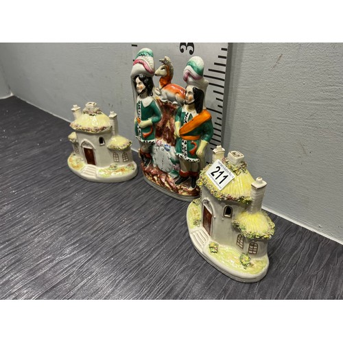 211 - 2 House book ends + staffordshire flat back