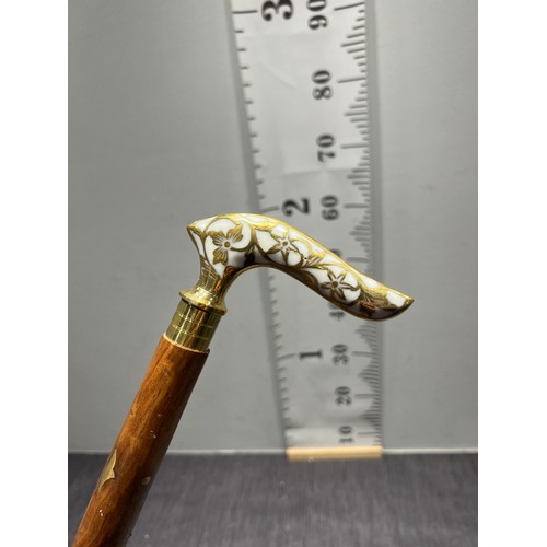 277 - Brass inlaid walking stick