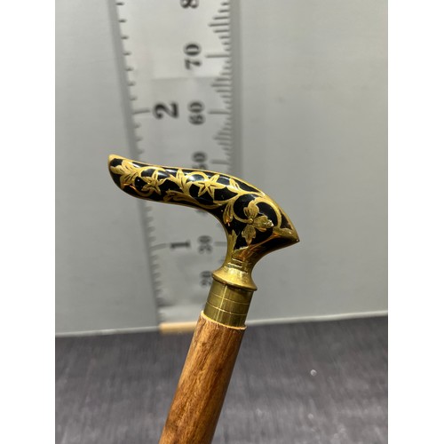 278 - Brass inlaid walking stick