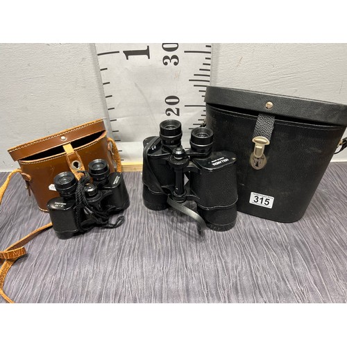 315 - 2 Pair binoculars in cases