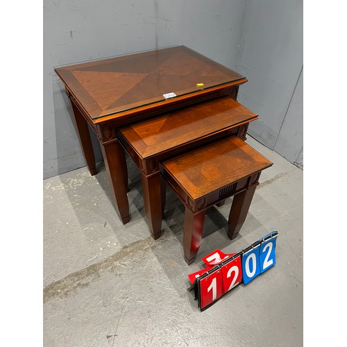 1202 - Vintage nest of glass top tables